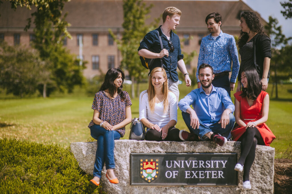 University of Exeter students outside on the campus